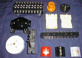 Examples of compression molding and insert molding